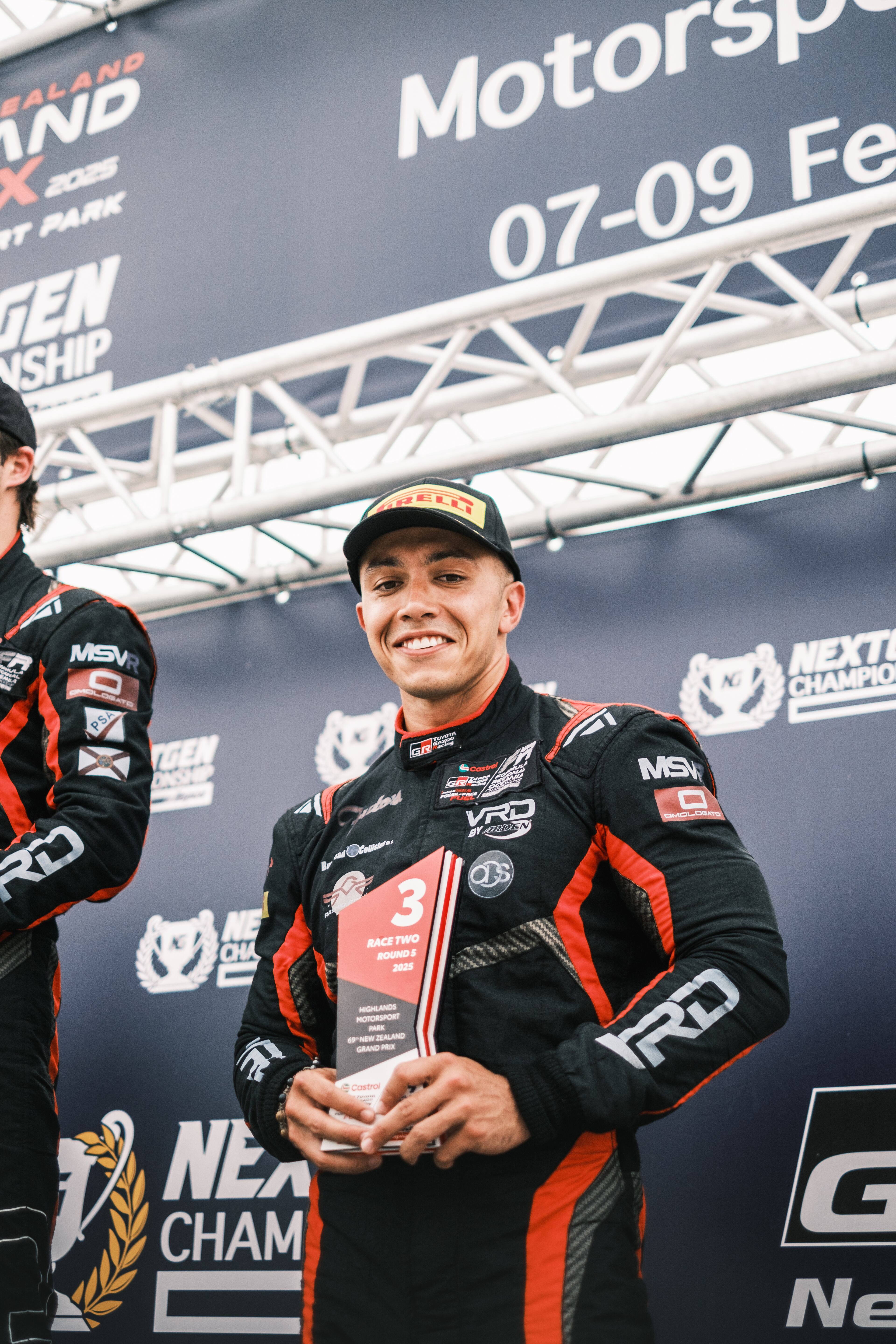 Shawn Rashid on the podium after his third-place finish at the Formula Regional Oceania Championship's New Zealand Grand Prix at Highlands Motorsport Park-New Zealand on Feb. 9, 2025. (Photo courtesy of Relay Film)