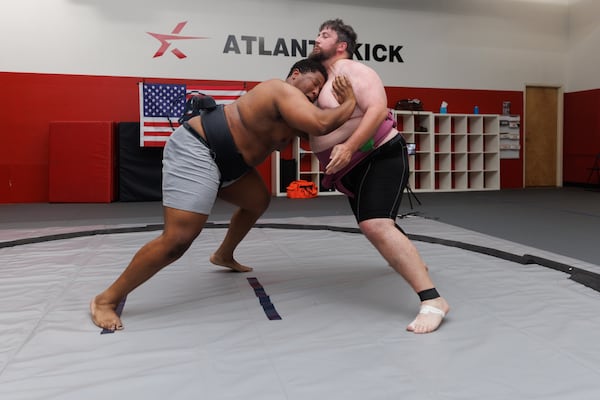 Jabari Webb (left) and Taylor Fordham wrestle during Black Dragon Beya sumo practice at Atlanta Kick in Atlanta, June 30, 2026. (Estela Muñoz/AJC)