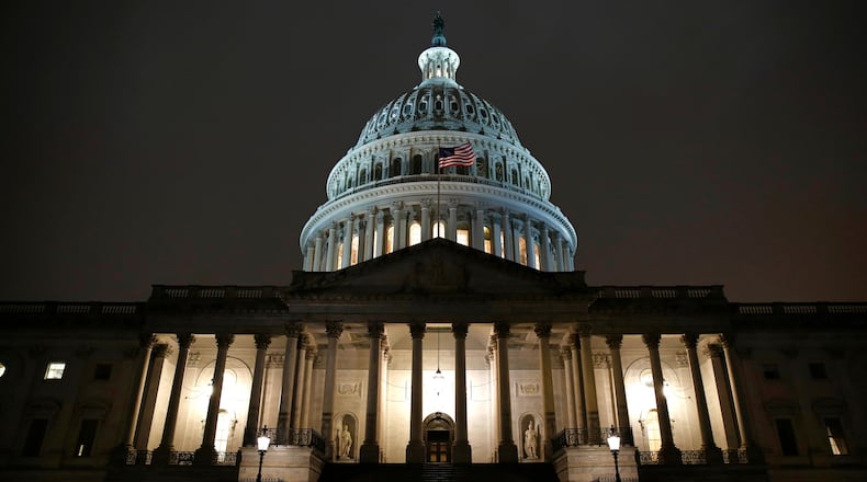Lights shine on the U.S. Capitol dome
