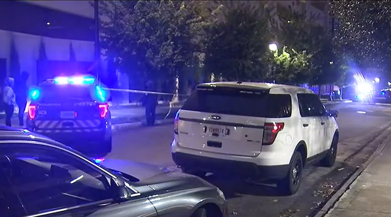 A deadly shooting at the AMLI Lenox apartment building on Lakeside Drive in Buckhead was one of three killings investigated by the Atlanta Police Department over the course of eight hours Thursday night and into Friday morning.