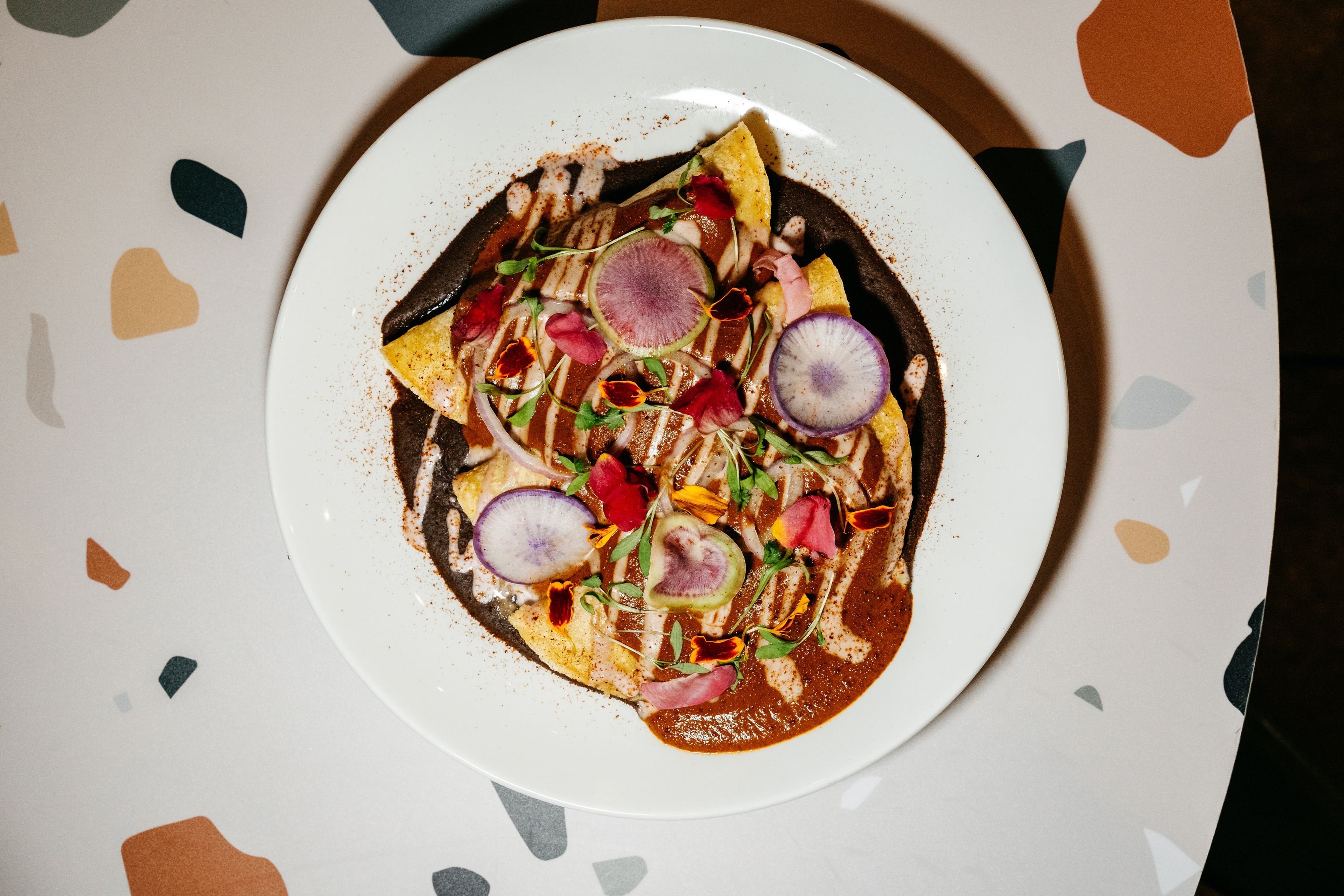 The enmoladas at La Semilla feature local vegetables and corn tortillas. (Courtesy of Ash Wilson/La Semilla)