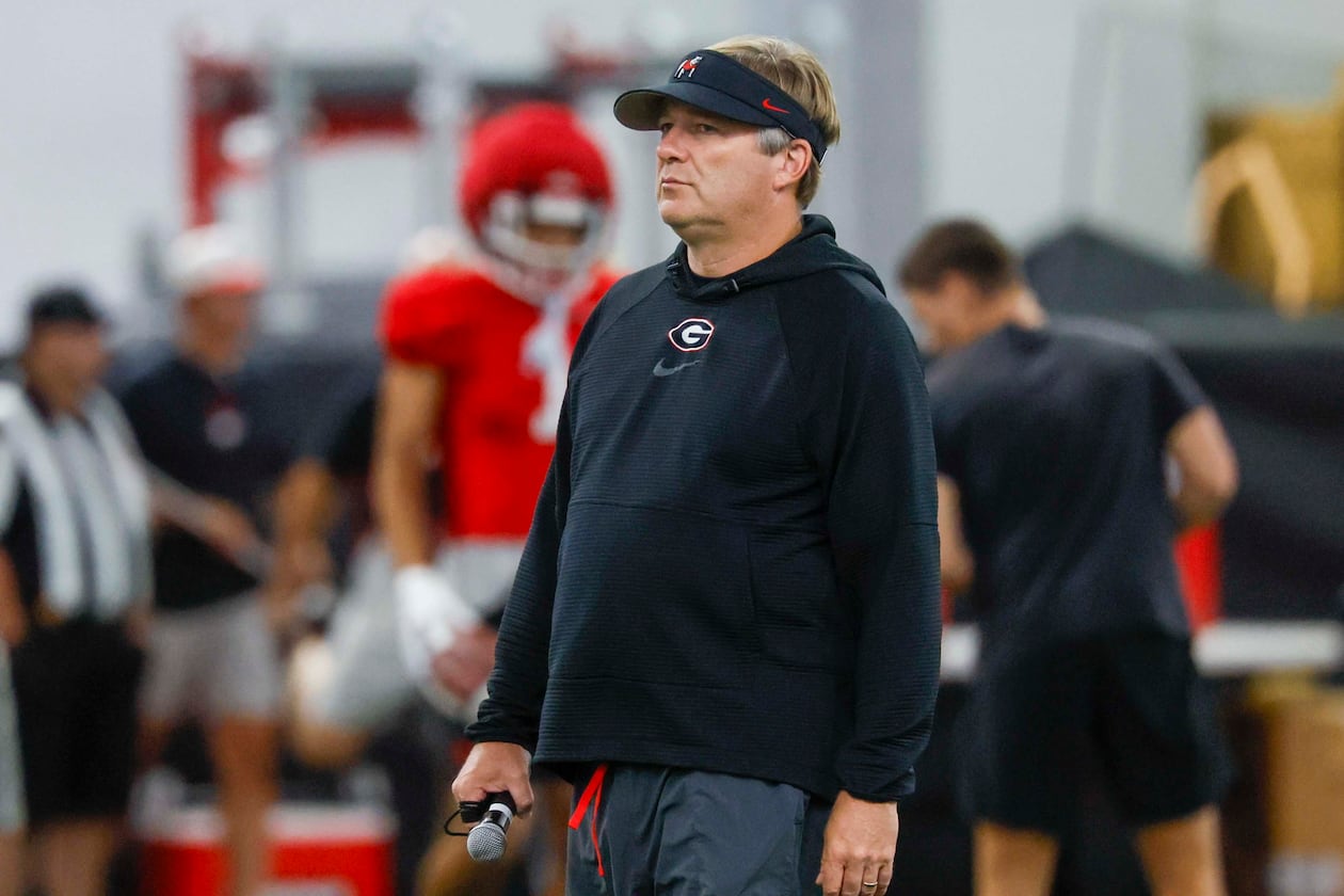 Georgia coach Kirby Smart watches his team during their first fall football practice on Wednesday, Aug. 5, 2026, in Athens. Smart has faced only three teams currently in the Big Ten, emerging victorious each time. (Miguel Martinez/AJC)