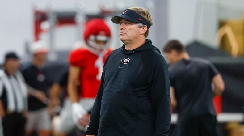 Georgia coach Kirby Smart watches his team during their first fall football practice on Wednesday, Aug. 5, 2026, in Athens. Smart has faced only three teams currently in the Big Ten, emerging victorious each time. (Miguel Martinez/AJC)