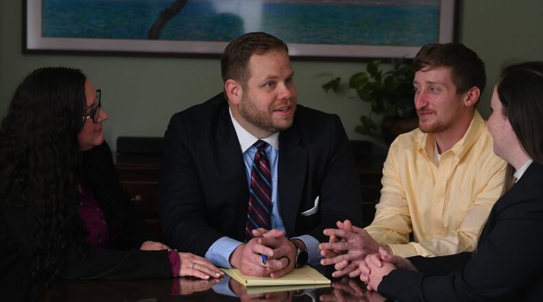 Robert Busbee (center) died unexpectedly on the morning of May 22. Gov. Brian Kemp will name a replacement to complete the rest of Busbee’s four-year term in the Ogeechee Judicial Circuit. (Courtesy)