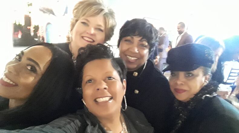 Founder Angie Sims (center foreground) with members of the League of Girlfriends. (Courtesy of Angie Sims)