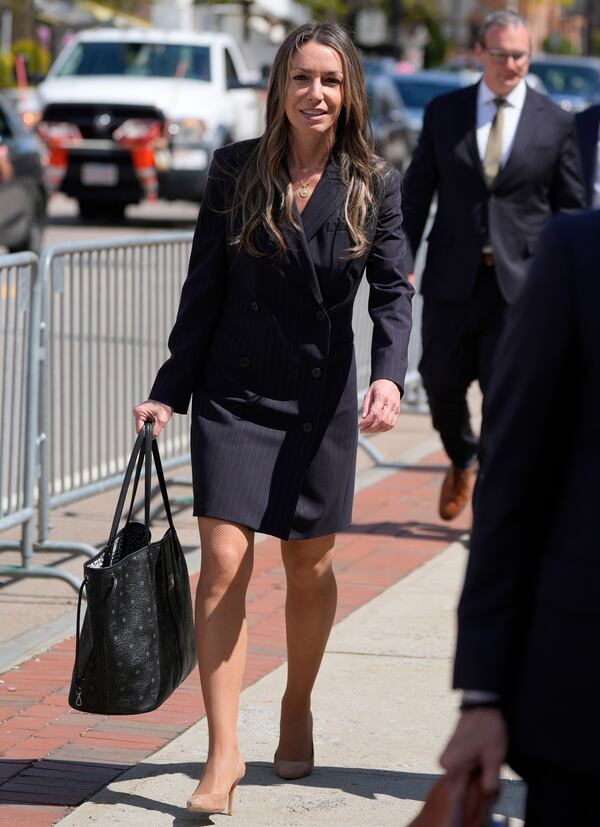 Karen Read returns to court following the lunch break with her defense attorney Robert Alessi at her trial at Norfolk Superior Court, Tuesday, April 22, 2025, in Dedham, Mass. (AP Photo/Charles Krupa)