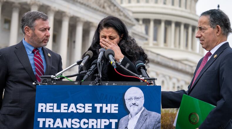From left, Rep. Eugene Vindman, D-Va., Hanan El-Atr Khashoggi, the widow of slain journalist Jamal Khashoggi, and Rep. Jamie Raskin, D-Md., hold a news conference as they call on President Donald Trump to release the transcript of a call he had with Saudi Crown Prince Mohammed bin Salman after Khashoggi's killing, at the Capitol in Washington, Friday, Nov. 21, 2025. (AP Photo/J. Scott Applewhite)