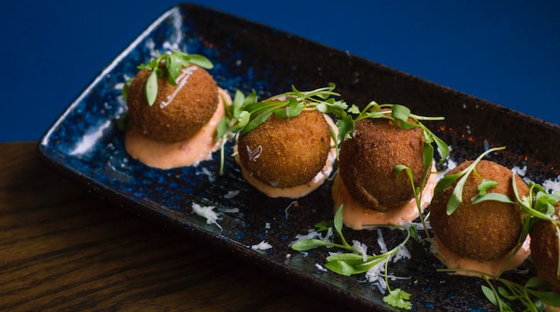 Croquettes jamon are served over a piquillo aioli at Marietta’s Silla Del Toro. Courtesy of Adam Disser