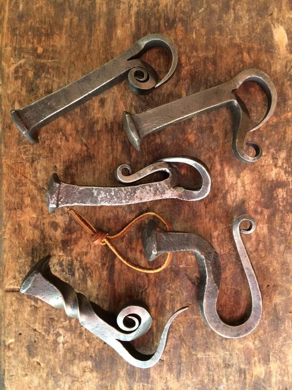 Atlanta blacksmith Nelms Creekmur likes to forge practical items, like his popular railroad spike bottle openers, with a high aesthetic appeal. CONTRIBUTED BY NELMS CREEKMUR