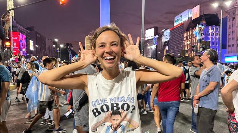 Katlyn Stevens celebrates in downtown Buenos Aires following Argentina's semifinal win against Croatia on Tuesday, December 13, 2022.