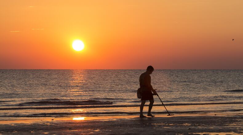 A Florida man is looking for the owner of a necklace holding cremains he found while metal detecting in the ocean.