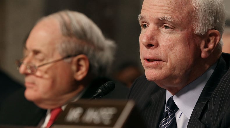 Sen. John McCain, R-Ariz., questions Defense Secretary Robert Gates at a Feb. 10, 2010, Senate Armed Services Committee hearing on Capitol Hill the proposed Department of Defense budget request for fiscal year 2011 and a review of the "Don't Ask, Don't Tell" policy. (Mark Wilson/Getty Images)