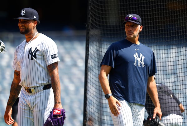 New York Yankees' Luis Gil, left, and Andy Pettitte, right, are on the field during live batting practice before a baseball game between the New York Yankees and the Baltimore Orioles, Saturday, June 21, 2025, in New York. (AP Photo/Noah K. Murray)