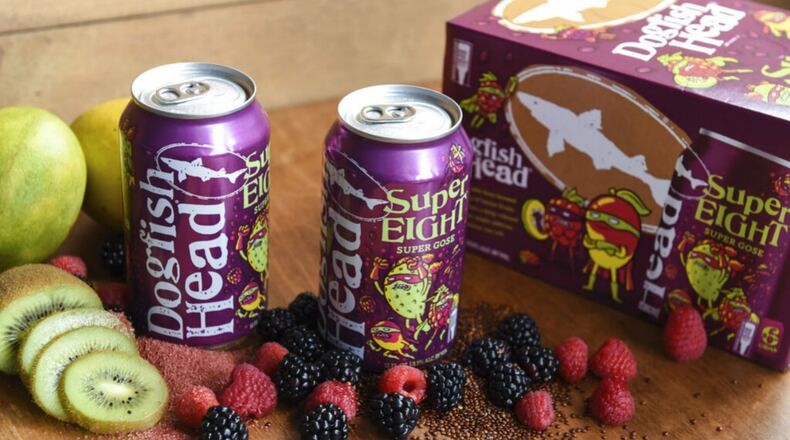 In this undated photo provided by Dogfish Head Craft Brewery, cans of Dogfish's SuperEight beer are displayed on a table in Milton, Del. Kodak says the new beer hitting the market can be used to develop its Super 8 movie film. Dogfish Head Craft Brewery in Delaware created its SuperEIGHT beer after a conversation with people at Kodak, the upstate New York technology company most famous for its photographic roots. (Photo: Dogfish Head Craft Brewery via AP)