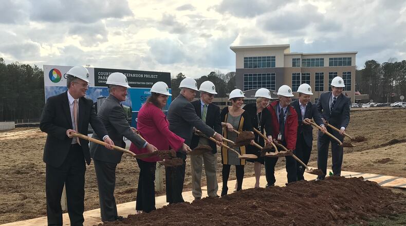 Gwinnett County officials broke ground Tuesday on the first phase of the county's courthouse expansion.