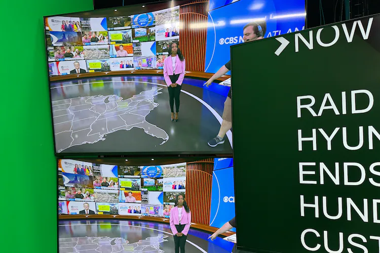 CBS Atlanta news anchor Jobina Fortson-Evans and director Sam Snook during a newscast rehearsal in Atlanta on Friday, Sept., 5, 2025. (Courtesy of Alex Sanz/CBS News Atlanta)