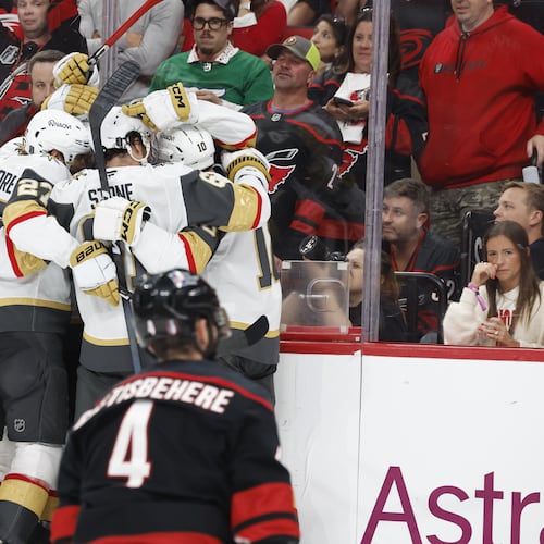 Vegas Golden Knights celebrate a goal by Tomas Hertl, during the third period in Game 1 of the NHL hockey Stanley Cup Final series against the Carolina Hurricanes in Raleigh, N.C., Tuesday, June 2, 2026. (AP Photo/Karl DeBlaker)