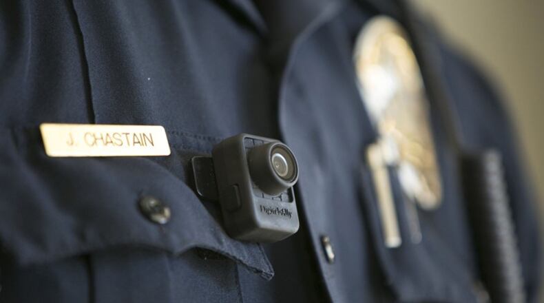 A federal grant will help the Woodstock Police Department implement a body-worn camera program for its officers. PHIL SKINNER / AJC FILE