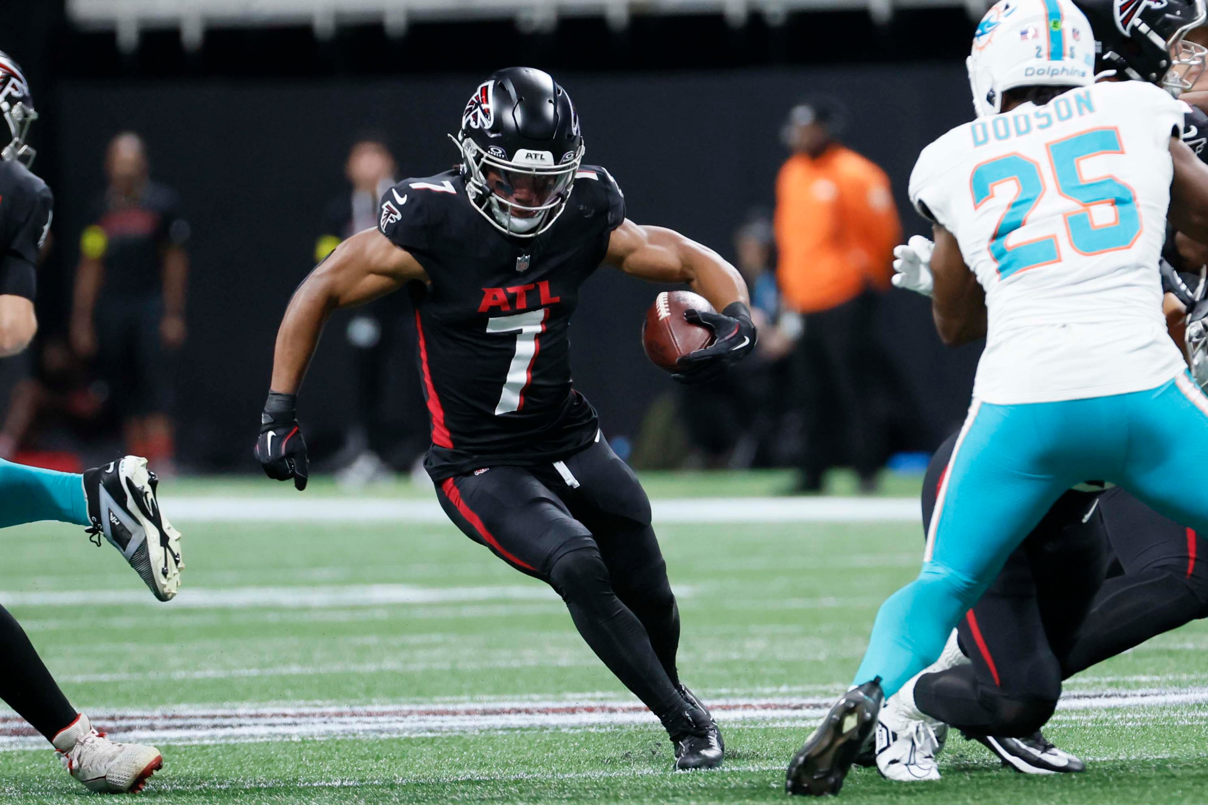 Atlanta Falcons running back Bijan Robinson runs for yards during the first half of an NFL football game against the Miami Dolphins at Mercedes-Benz Stadium in Atlanta on Sunday, Oct. 26, 2025. (Miguel Martinez/AJC)
