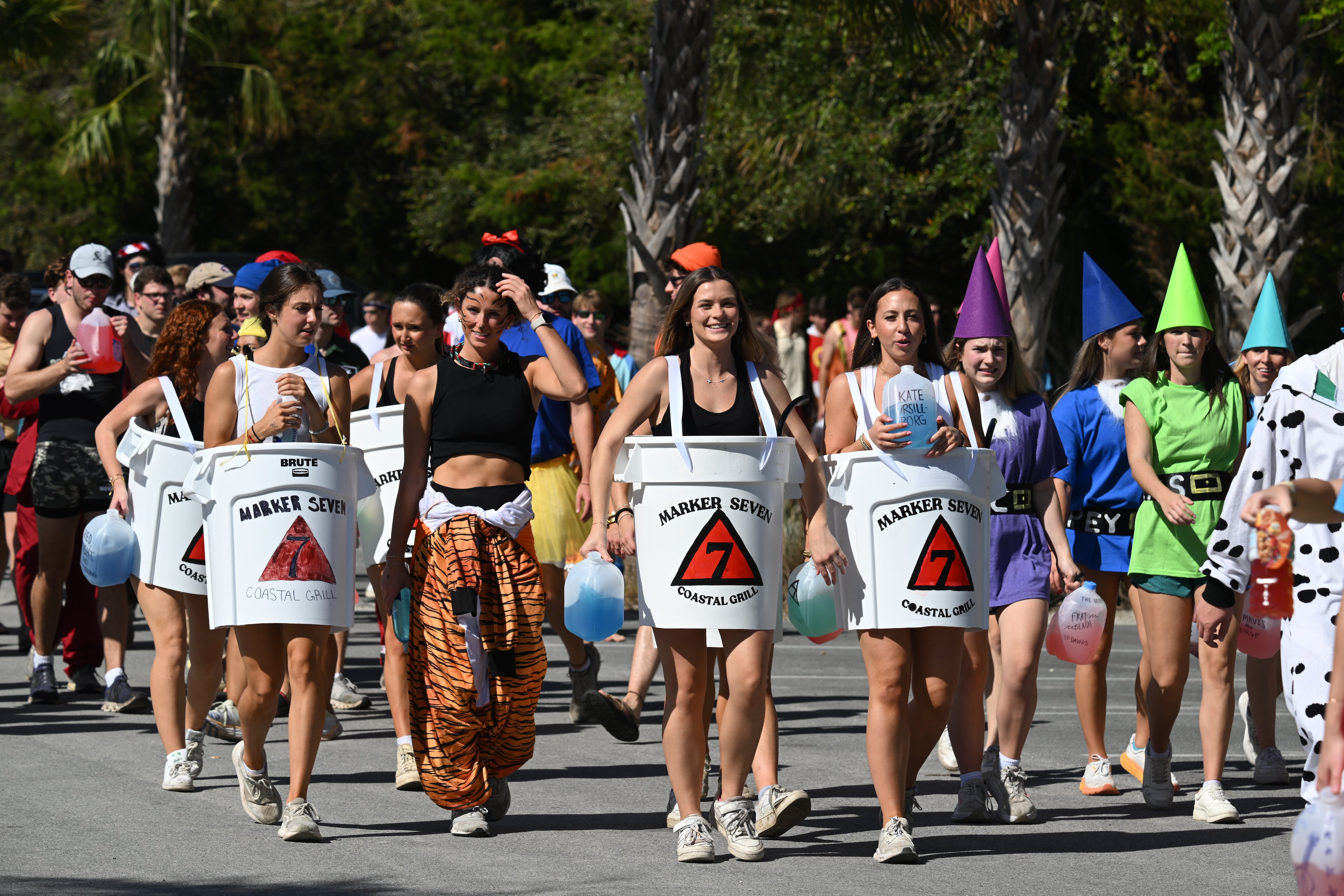 UGA students with Halloween costumes arrive for the annual “Frat Beach” party to celebrate before the annual Georgia-Florida football game on St. Simons Island, Friday, November 1, 2024. On the weekend of the Georgia-Florida football game, St. Simons Island’s East Beach becomes “Frat Beach,” an open-air party teeming with thousands of college students. (Hyosub Shin / AJC)