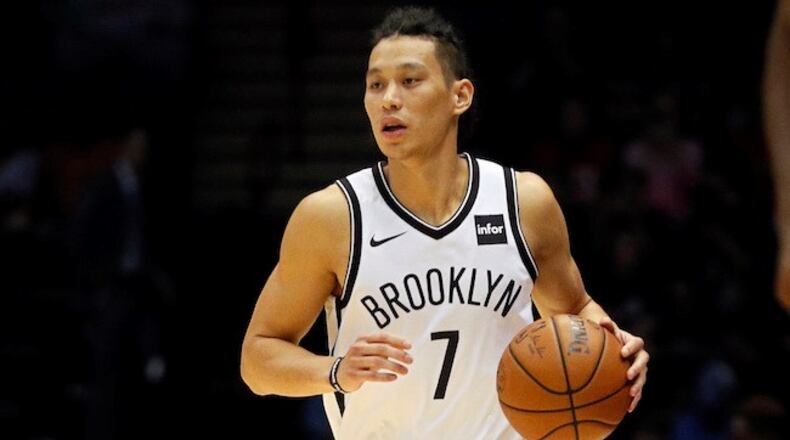 Jeremy Lin  of the Brooklyn Nets moves the ball during a preseason NBA basketball game against the Philadelphia 76ers on October 11, 2017.   (Photo by Paul Bereswill/Getty Images)