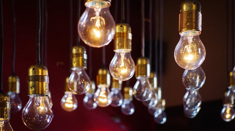 The Department of Energy is tossing out new light bulb standards that would have taken effect in January and would have phased incandescent and halogen bulbs.