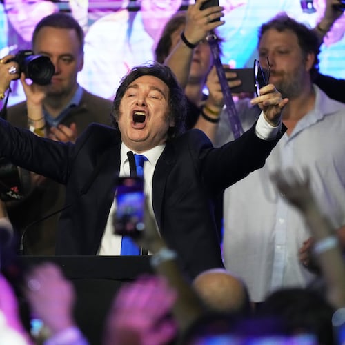 Argentina's President Javier Milei celebrates after winning in legislative midterm elections in Buenos Aires,  Argentina, Sunday, Oct. 26, 2025. (AP Photo/Rodrigo Abd)