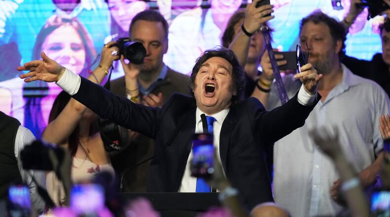 Argentina's President Javier Milei celebrates after winning in legislative midterm elections in Buenos Aires,  Argentina, Sunday, Oct. 26, 2025. (AP Photo/Rodrigo Abd)