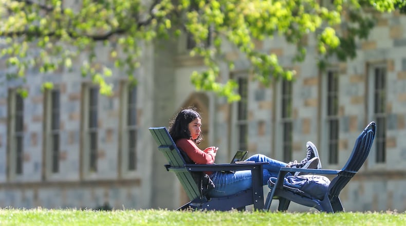 Emory University sophomore Isaiah Yisrael spends a mild day on the school’s quad studying last week. She was not alone, as many ventured outdoors after the morning chill to take in the warmer weather. But with higher temperatures come elevated pollen levels, and the pollen count soared above 3,000 on Thursday to set a new record.