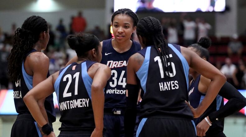 Atlanta Dream's Imani McGee-Stafford (34) leads a huddle against the New York Liberty Sunday, Aug. 12, 2018, in New York.