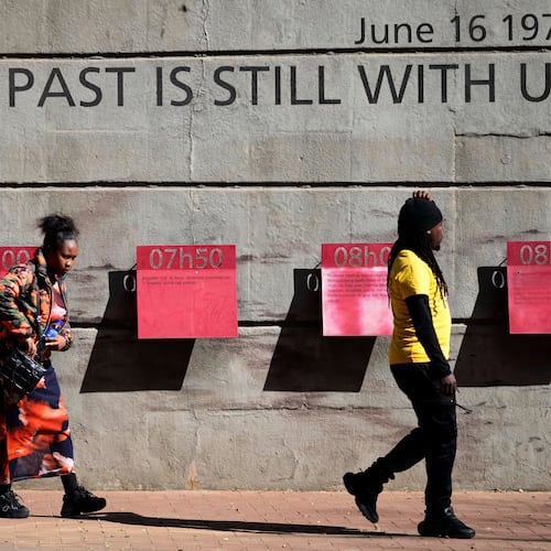 Youth visit the June 16 Memorial Acre, in Soweto, South Africa, Monday, June 15, 2026. (AP Photo/Themba Hadebe)
