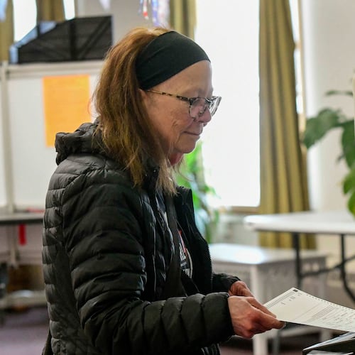 Kathleen Nutter of Wilmington, Vt., casts her ballot at the polling station in Wilmington, during Town Meeting Day in Vermont, Tuesday, March 3, 2026. (Kristopher Radder/The Brattleboro Reformer via AP)