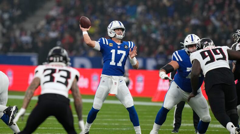 The Falcons defense sacked Daniel Jones seven times, but wore down at the end of the game. (Martin Meissner/AP)