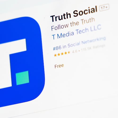 FILE - The download screen for Truth Social app is seen on a laptop computer, March 20, 2024, in New York. (AP Photo/John Minchillo, File)