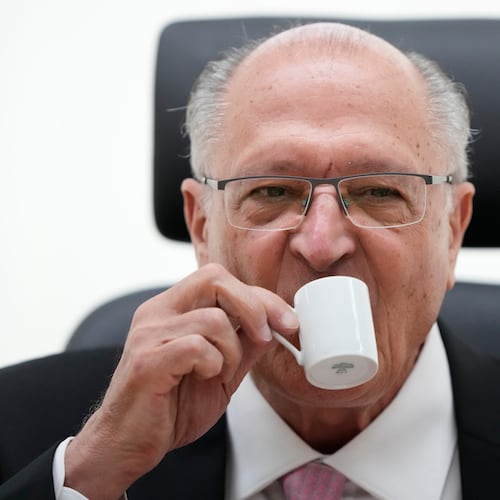 Brazil's Vice President Geraldo Alckmin drinks coffee during an interview in his office in Brasilia, Brazil, Wednesday, April 22, 2026. (AP Photo/Eraldo Peres)