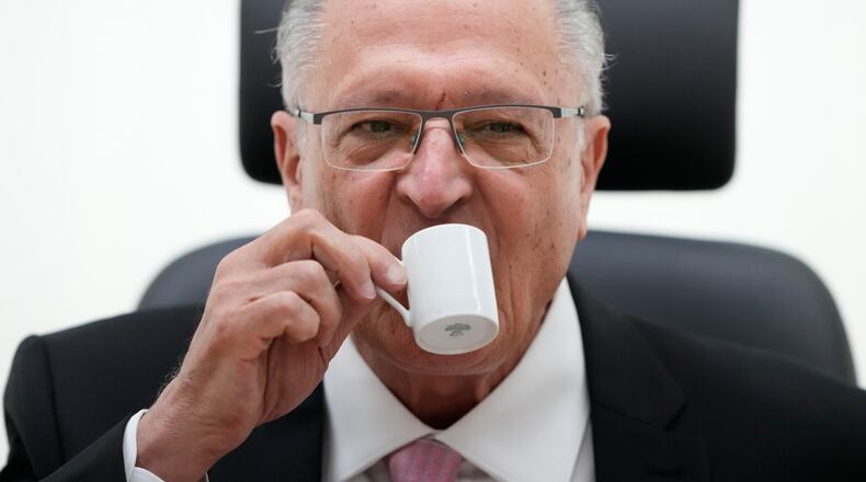 Brazil's Vice President Geraldo Alckmin drinks coffee during an interview in his office in Brasilia, Brazil, Wednesday, April 22, 2026. (AP Photo/Eraldo Peres)