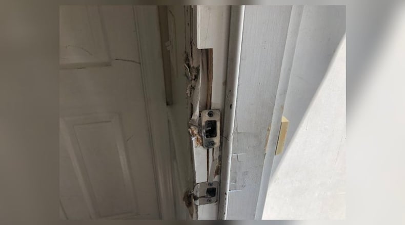 A crowbar was used to break into the apartment, police said.