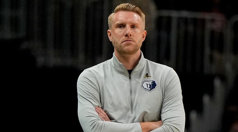 Memphis Grizzlies head coach Tuomas Iisalo watches play against the Atlanta Hawks during the first half of an NBA basketball game, Monday, March 23, 2026, in Atlanta. (AP Photo/Mike Stewart)