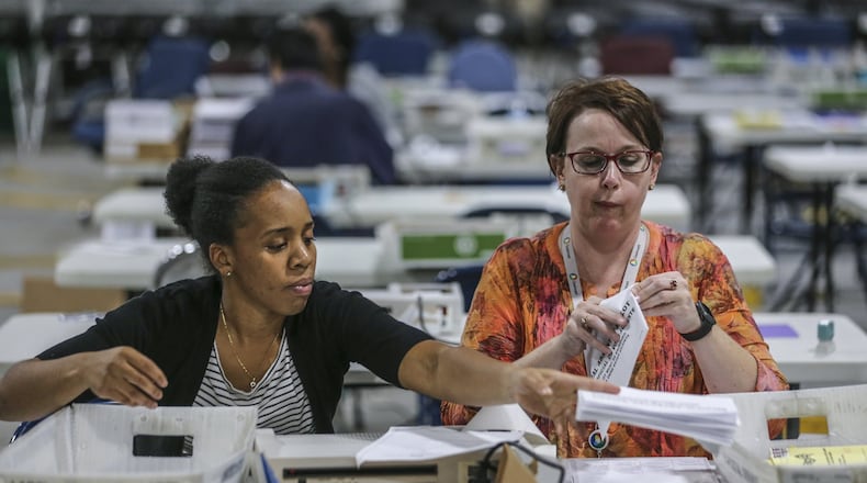 Kristi Royston (right) was hired as Gwinnett County’s new election director. JOHN SPINK/JSPINK@AJC.COM