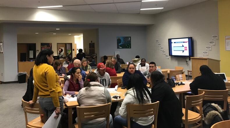 Parents and community members meet at Sutton Middle School on Tuesday, Jan. 22, 2019, to hear about the Atlanta school district's plans to rate all schools.