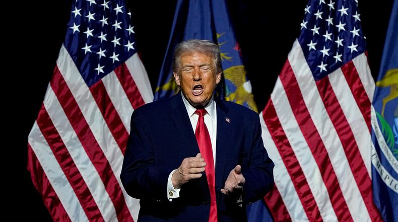 President Donald Trump speaks at the Detroit Economic Club Tuesday, Jan. 13, 2026 in Detroit. (AP Photo/Ryan Sun)