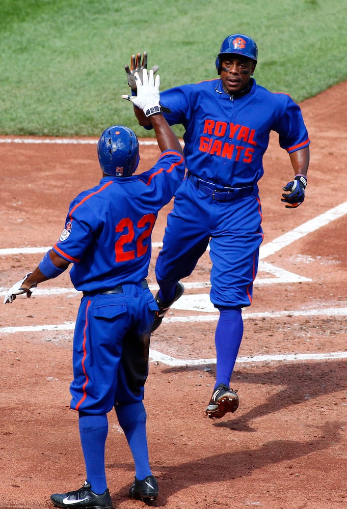 Bright blue and bright orange collide on Mets uniforms