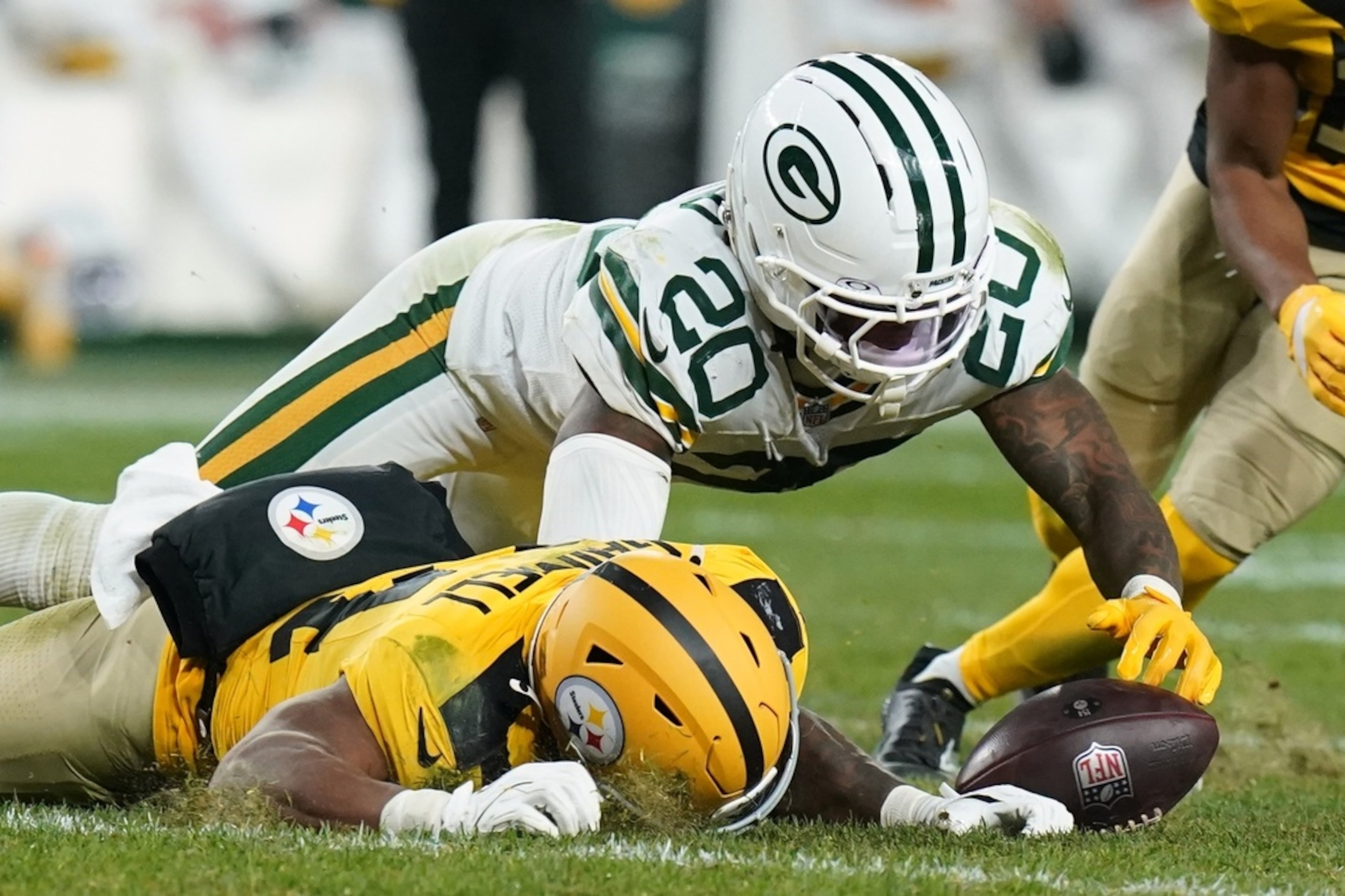Green Bay Packers' Javon Bullard recovers a fumble by Pittsburgh Steelers' Kenneth Gainwell during the second half of an NFL football game Sunday, Oct. 26, 2025, in Pittsburgh. (Matt Freed/AP)