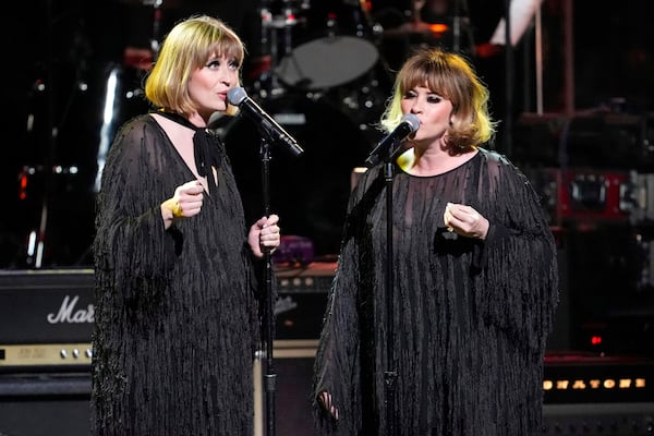 FILE - Holly Laessig, left, and Jess Wolfe of Lucius perform at the 8th annual Love Rocks NYC concert on March 7, 2024, in New York. (Photo by Charles Sykes/Invision/AP, File)