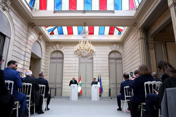 French President Emmanuel Macron, right, and Lebanese President Joseph Aoun attend a joint press conference at the Elysee Palace in Paris, Friday, March 28, 2025. (Sarah Meyssonnier/Pool via AP)