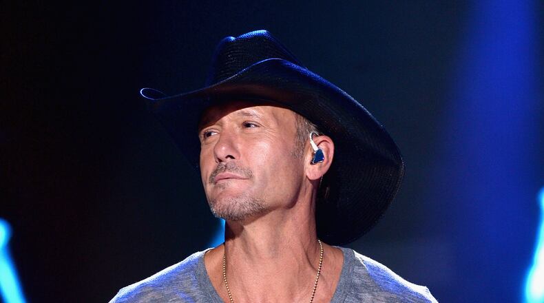 NASHVILLE, TN - JUNE 05: Tim McGraw performs onstage at the 2014 CMA Festival on June 5, 2014 in Nashville, Tennessee. (Photo by Larry Busacca/Getty Images) Tim McGraw will pay tribute to a legend. Photo: Getty Images.