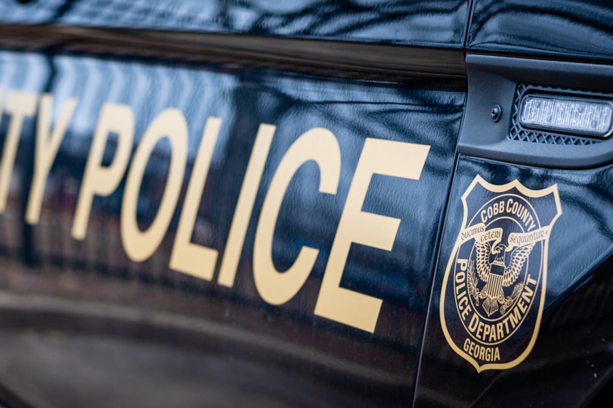 A driver was shot and killed by police after fleeing a Cobb traffic stop, crashing an SUV and then trying to get out of the vehicle with a gun, authorities said Saturday. The incident marks the second fatal shooting by the Cobb County Police Department in less than two weeks.