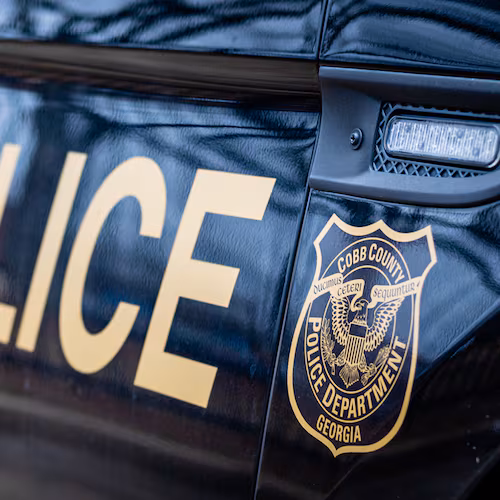 A driver was shot and killed by police after fleeing a Cobb traffic stop, crashing an SUV and then trying to get out of the vehicle with a gun, authorities said Saturday. The incident marks the second fatal shooting by the Cobb County Police Department in less than two weeks.
