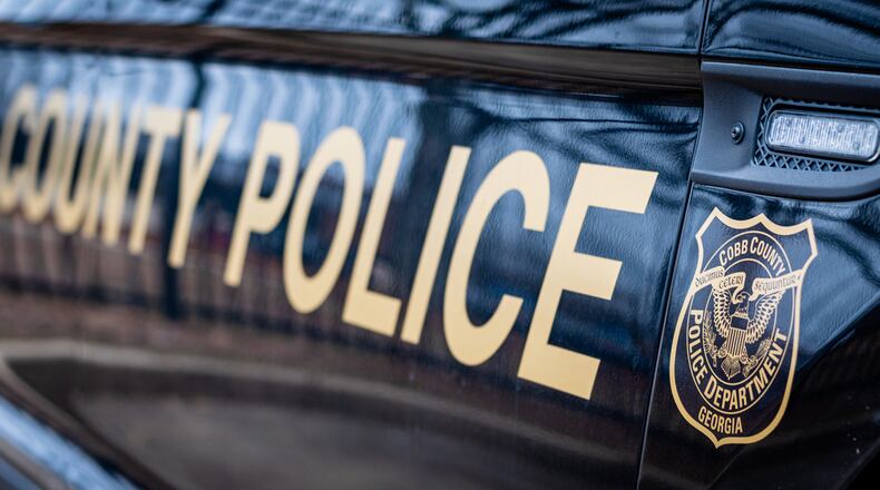 A driver was shot and killed by police after fleeing a Cobb traffic stop, crashing an SUV and then trying to get out of the vehicle with a gun, authorities said Saturday. The incident marks the second fatal shooting by the Cobb County Police Department in less than two weeks.