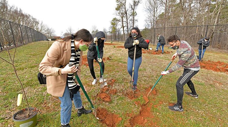 Despite the pandemic, GGC hosted several events throughout the year while following Centers for Disease Control and Prevention guidelines. In February, the college held a Georgia’s Arbor Day celebration where students and faculty gathered to plant 20 apple trees in the campus microfarm. (Courtesy Georgia Gwinnett College)